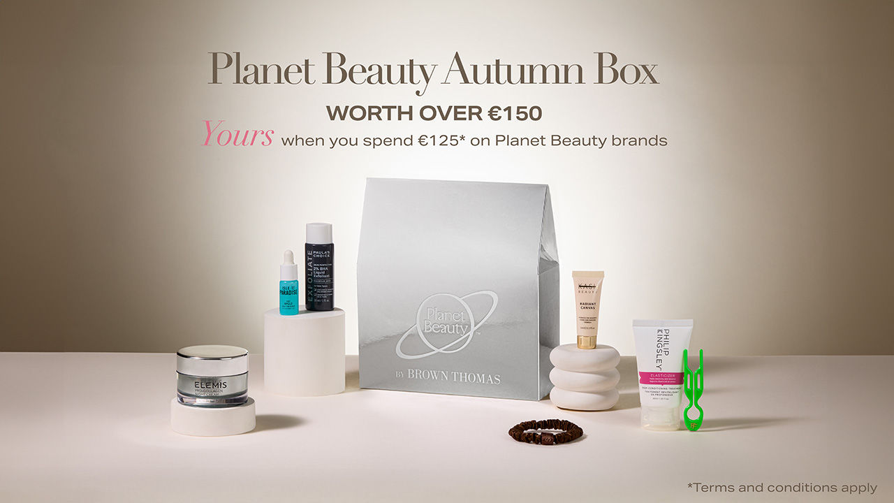 The planet beauty box with a text overlay, on a purple background