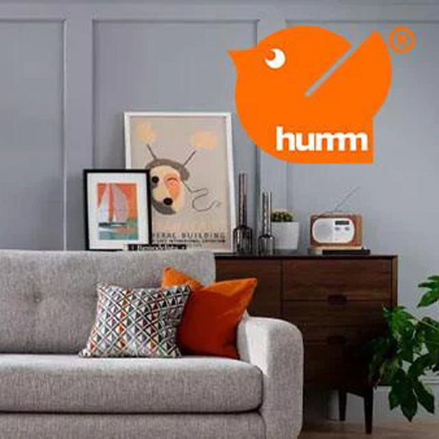 a couch with the humm logo overlaid