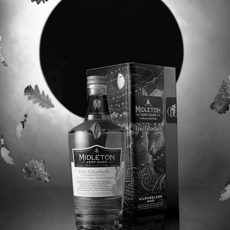 black and white photo of a bottle of Midleton Whiskey