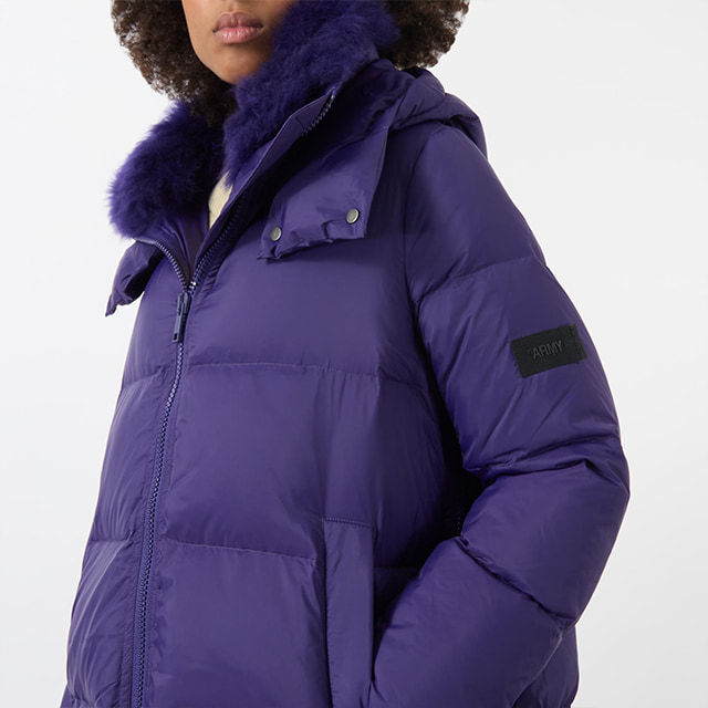 woman in purple winter jacket