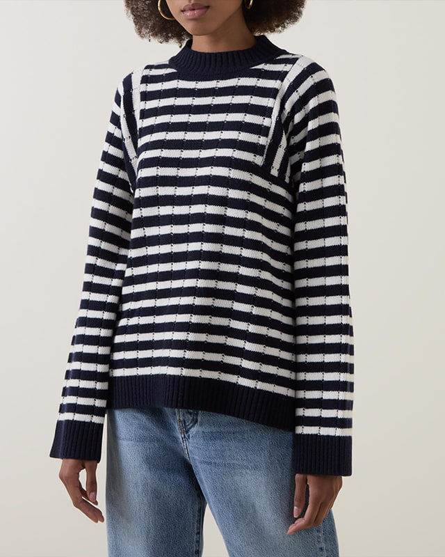 woman in striped knitted sweater