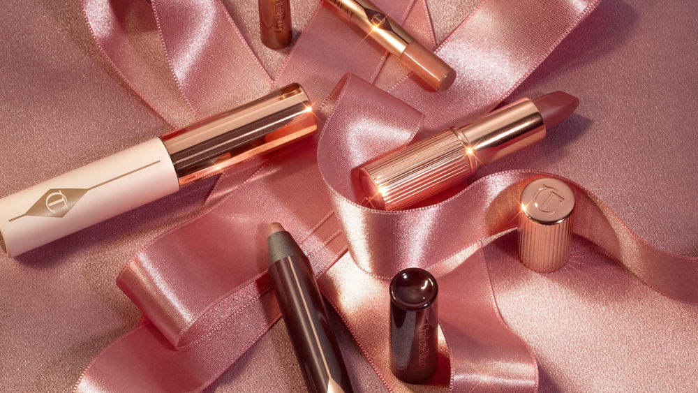 Charlotte Tilbury pillow talk products on pink background
